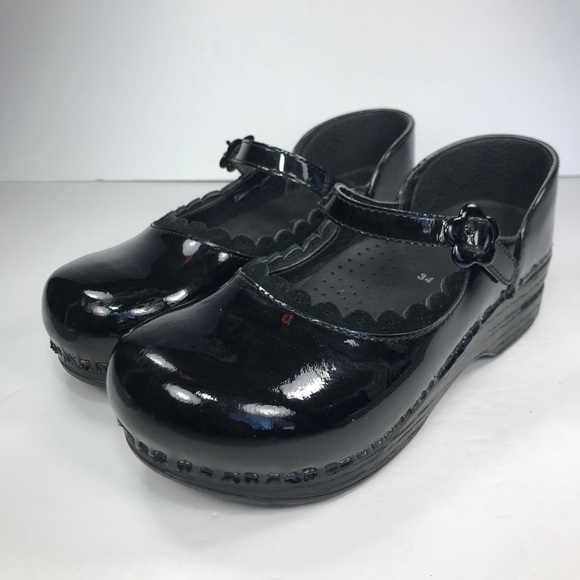 dansko patent leather clogs